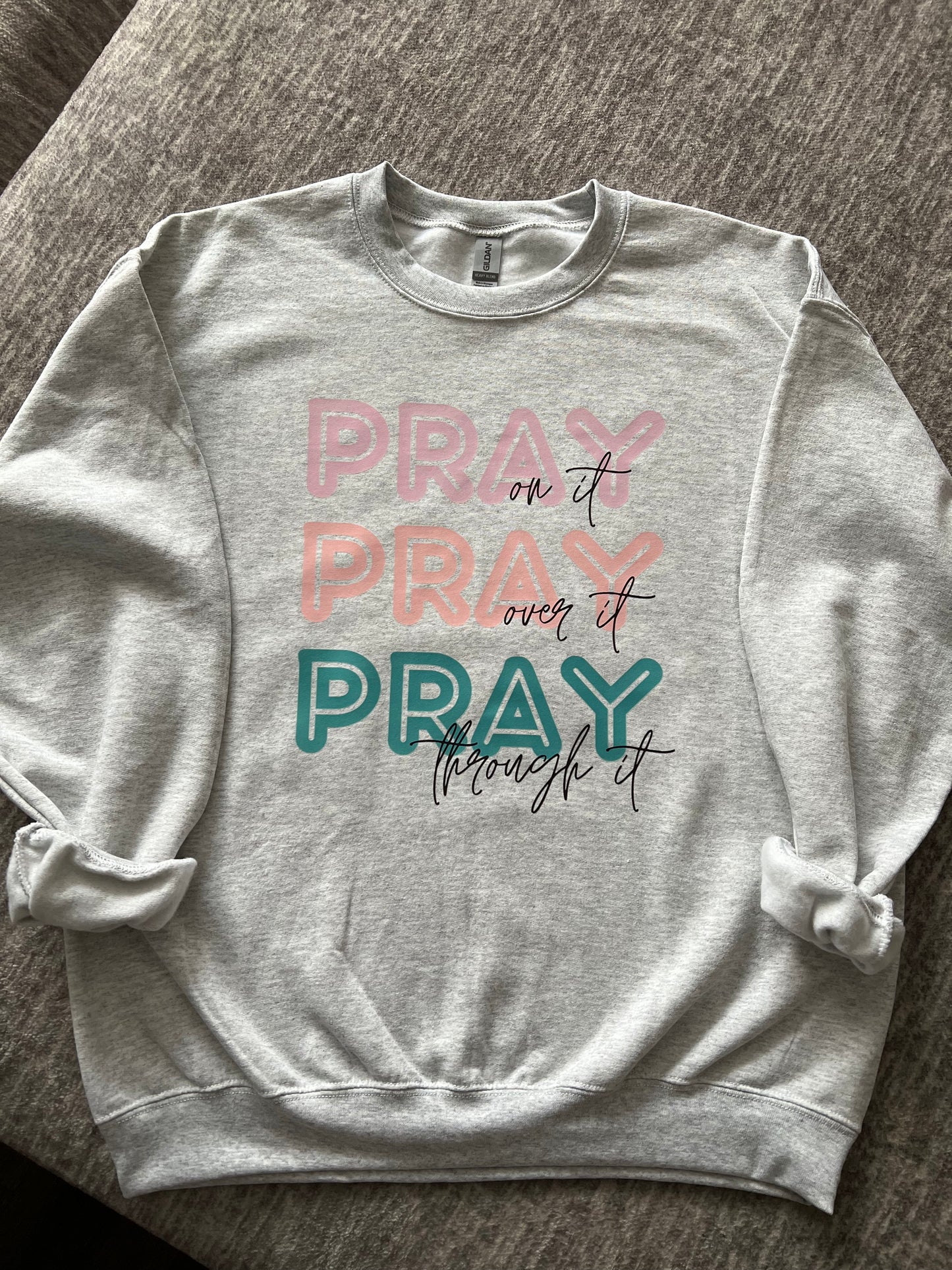 Pray on it, over it, through it Crewneck