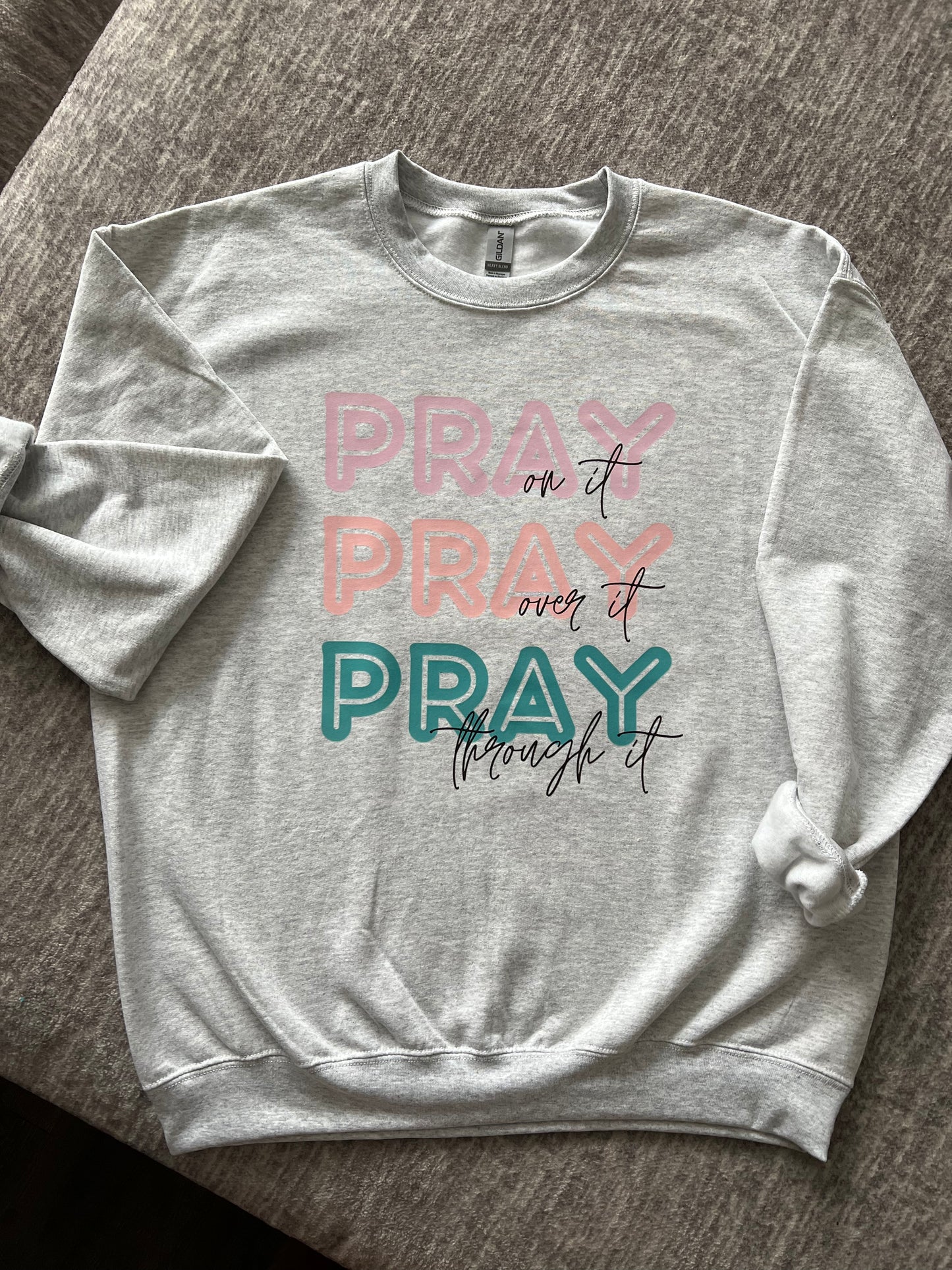 Pray on it, over it, through it Crewneck